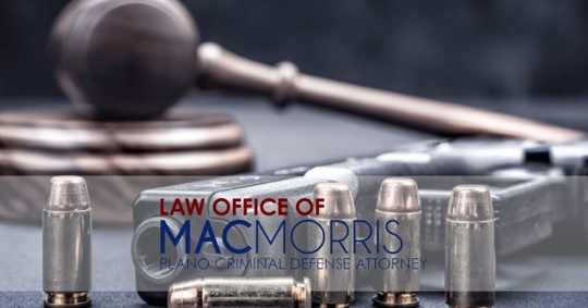 a gavel, gun, and bullets for firearm charges